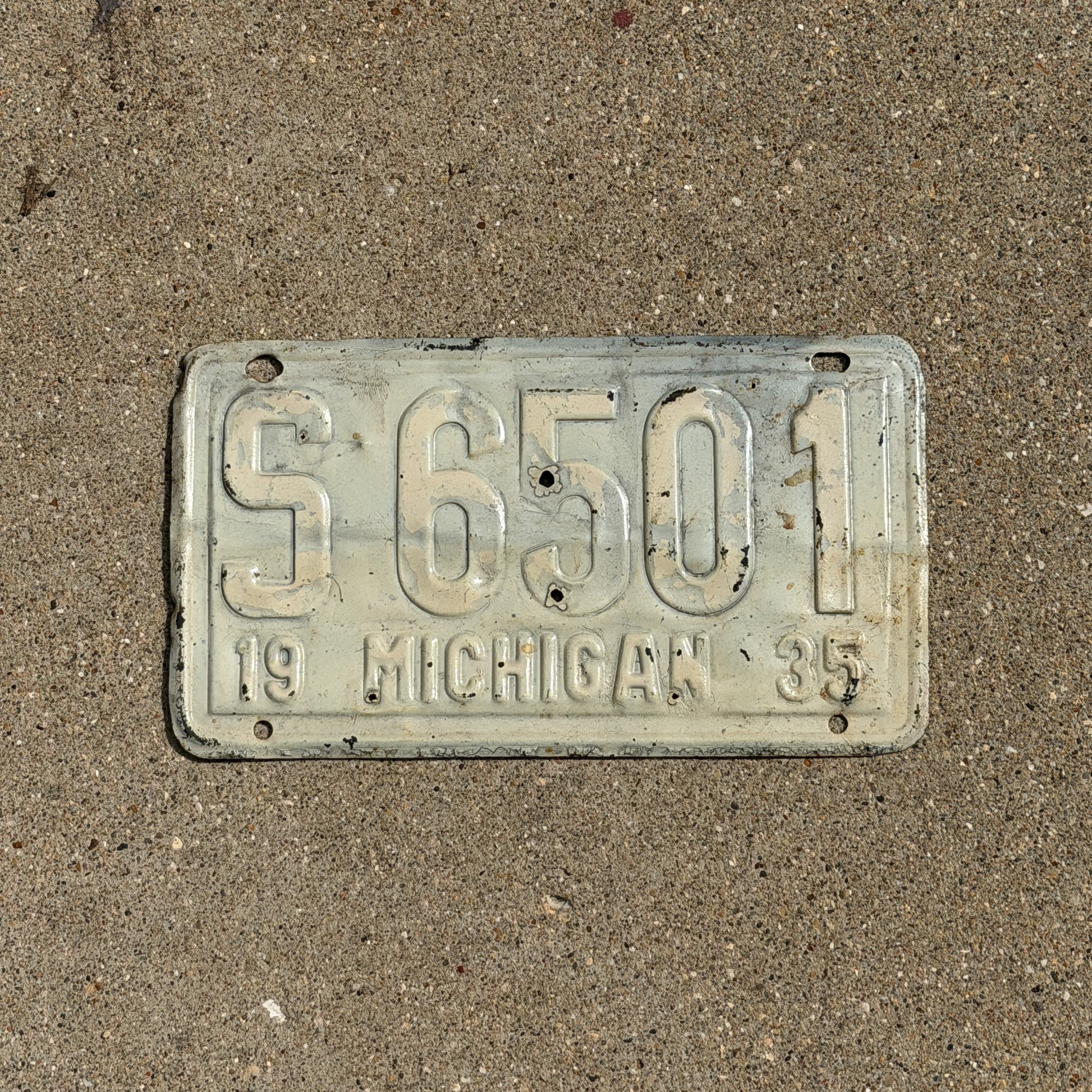 Photo of a 1935 Michigan License Plate Auto Tag Garage Decor Vintage S 6501 with original patina