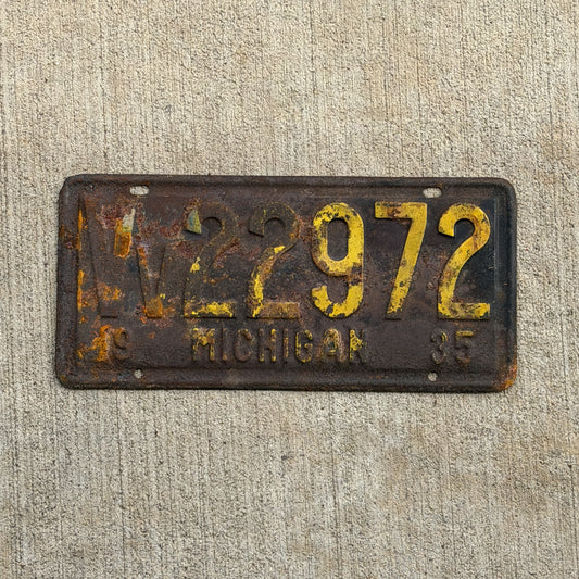 Photo of a 1935 Michigan Veteran License Plate Auto Tag Garage Decor Vintage Military VV 22972 with original patina
