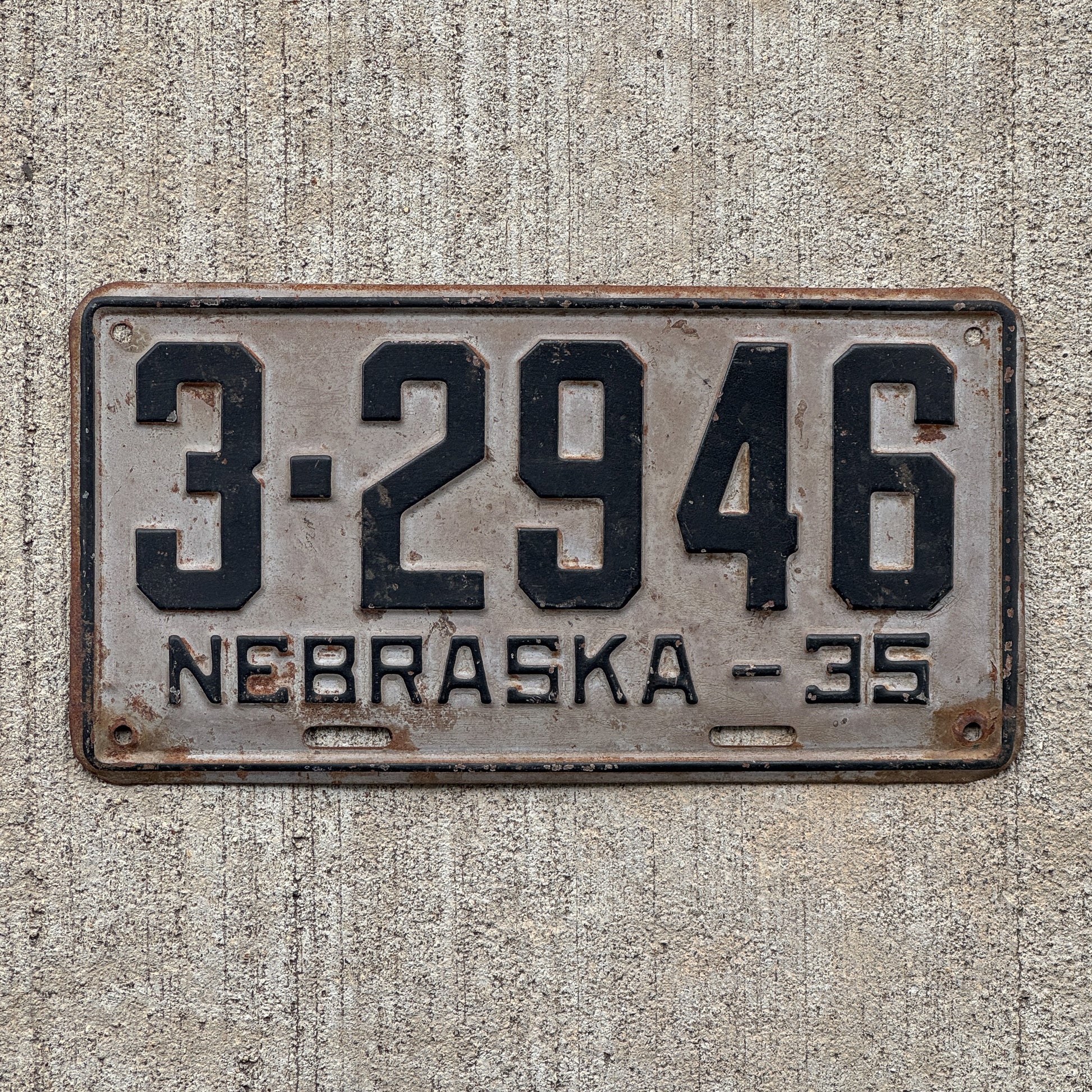 Photo of a 1935 Nebraska License Plate Auto Tag Garage Decor Vintage 3 2946 with original patina