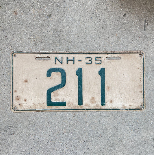 Photo of a 1935 New Hampshire License Plate Auto Tag Garage Decor Vintage Low Number Three Digit 211 with original patina