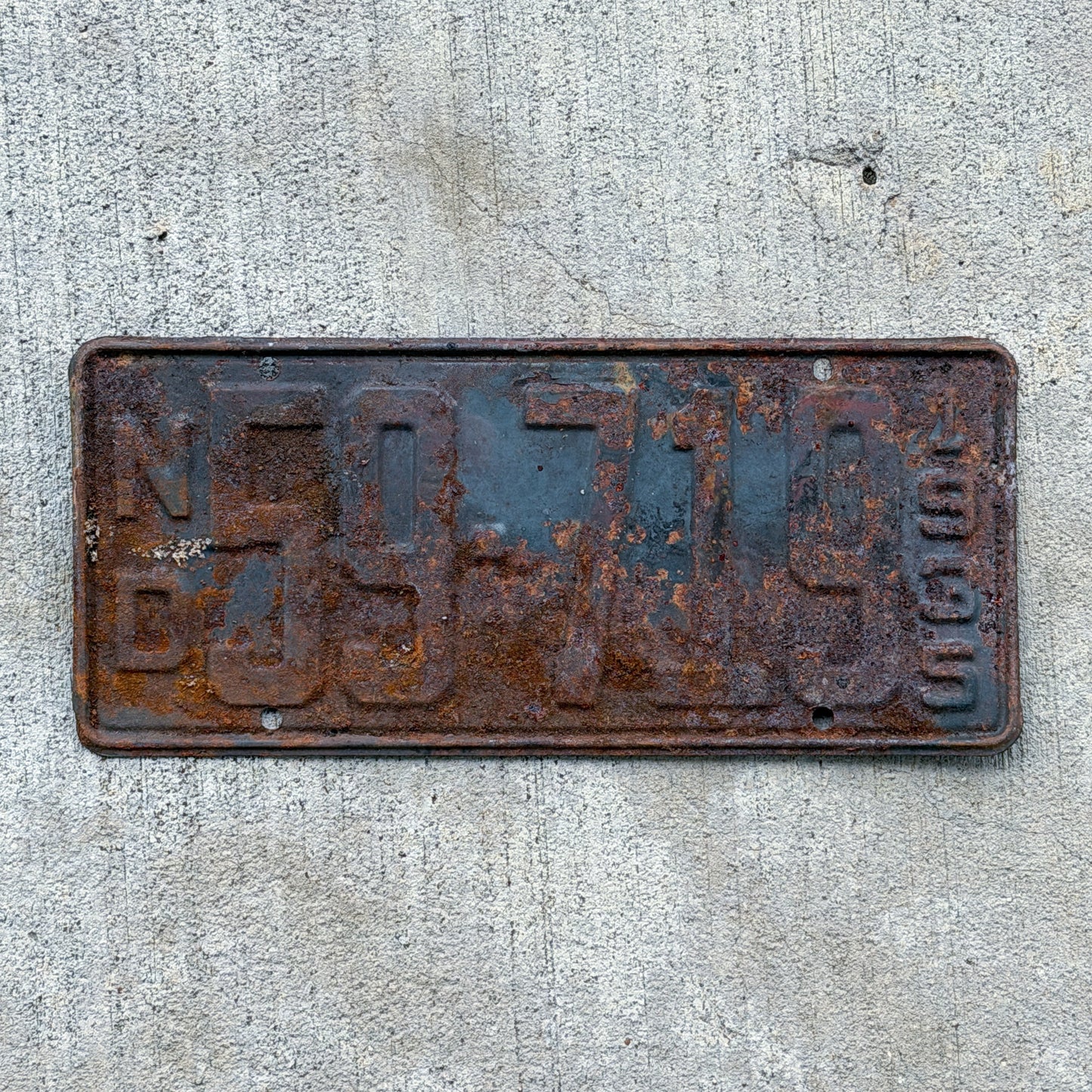 Photo of a 1935 North Dakota License Plate Auto Tag Garage Decor Vintage 59 719 with original patina
