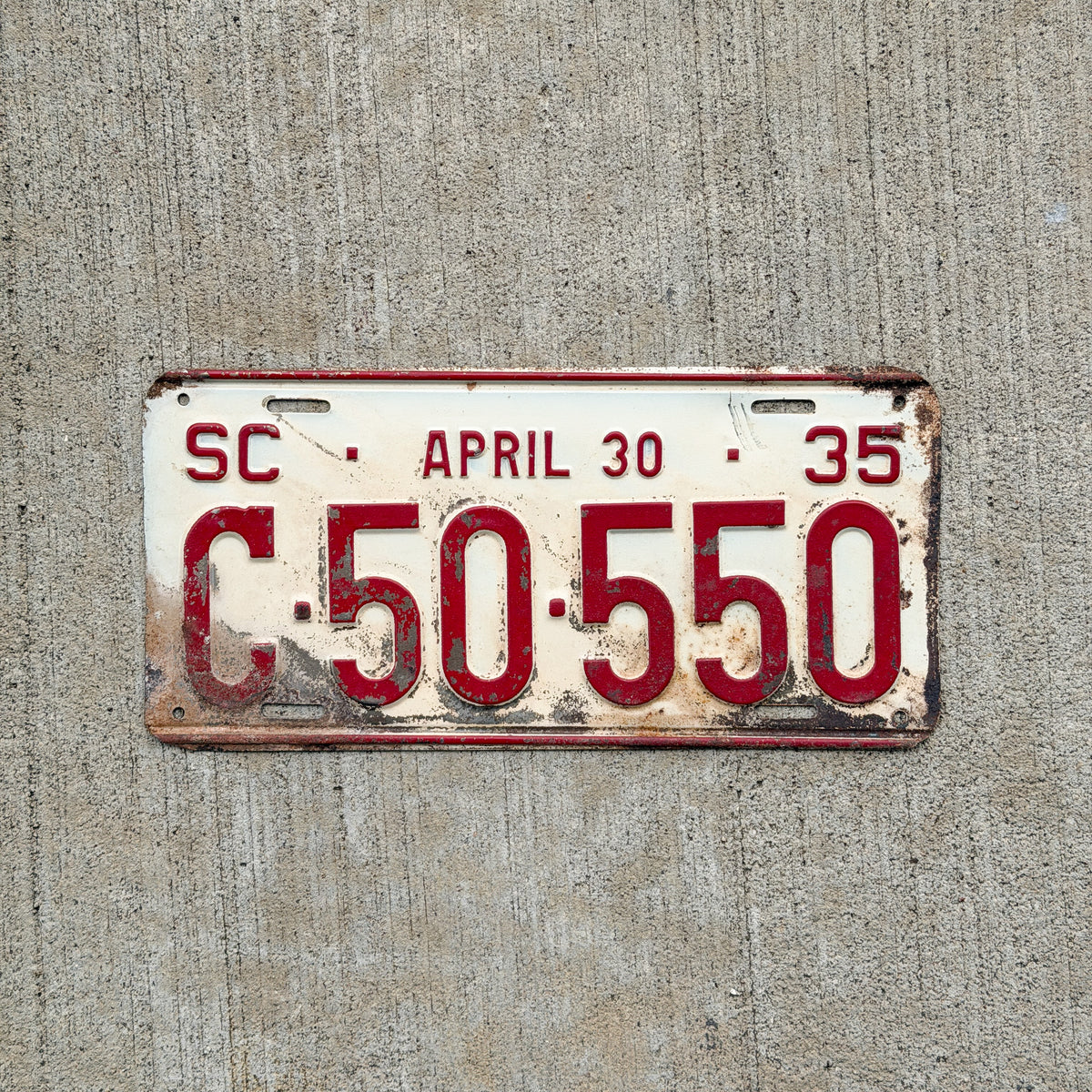 Photo of a 1935 South Carolina Taxi License Plate Auto Tag Garage Decor Vintage Half Year C 50 550 with original patina