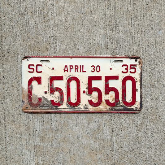 Photo of a 1935 South Carolina Taxi License Plate Auto Tag Garage Decor Vintage Half Year C 50 550 with original patina