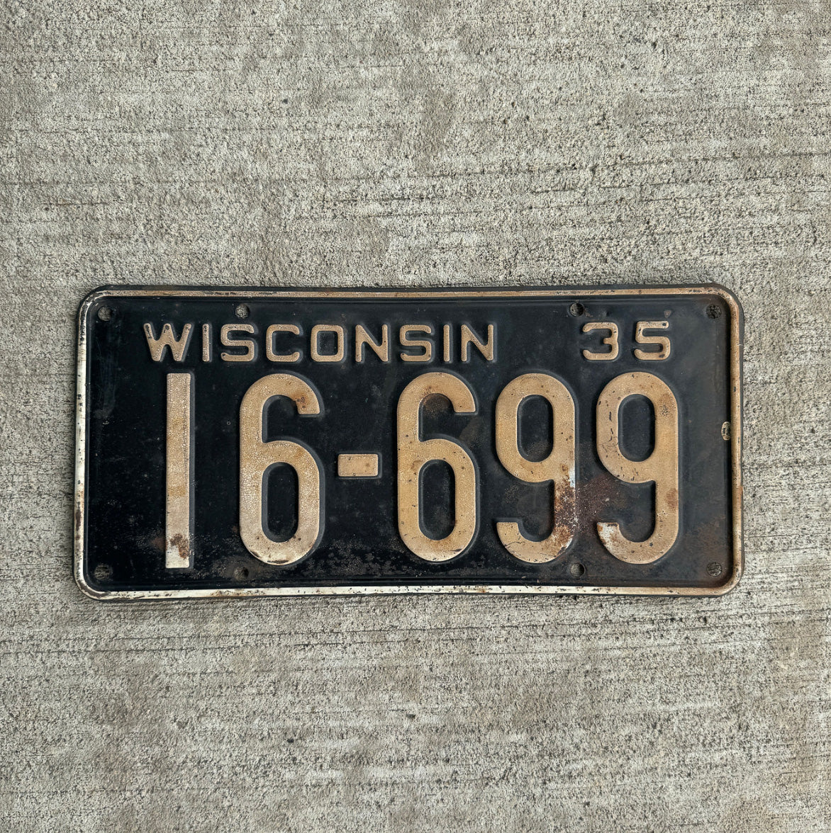 Photo of a 1935 Wisconsin License Plate Auto Tag Garage Decor Vintage 16 699 with original patina