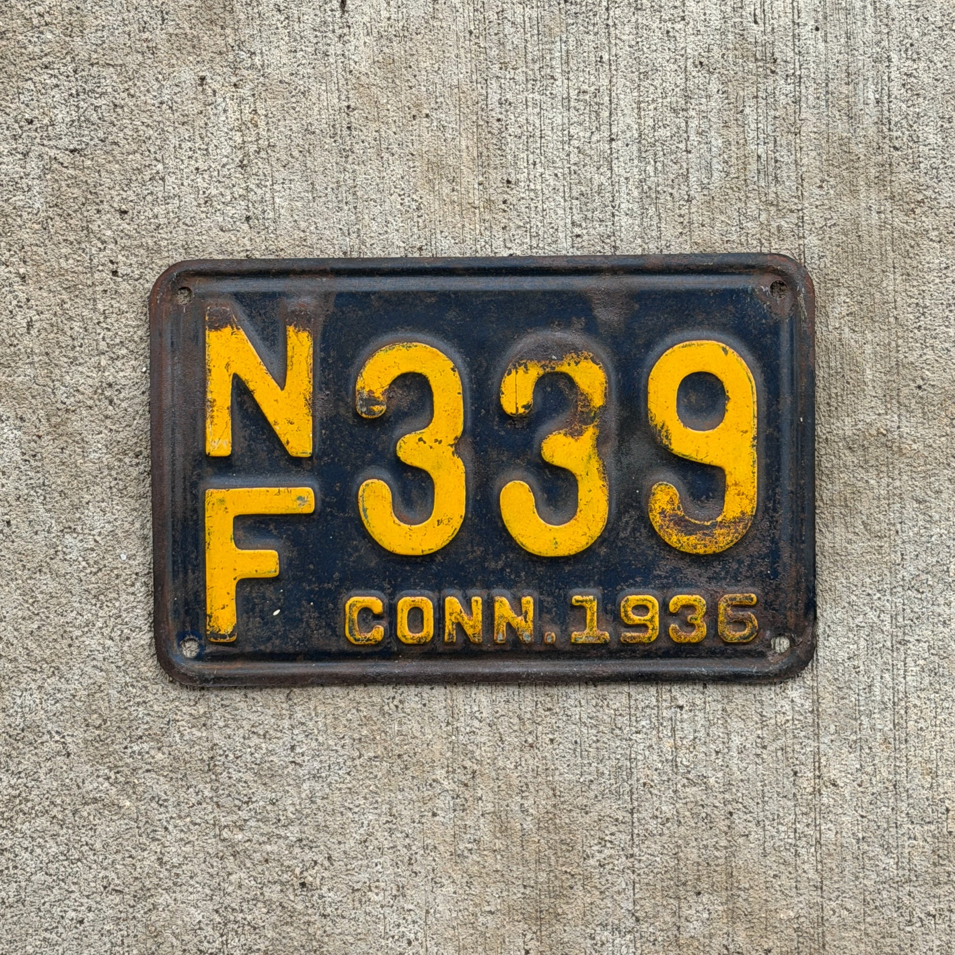 Photo of a 1936 Connecticut License Plate Auto Tag Garage Decor Vintage NF 339 with original patina
