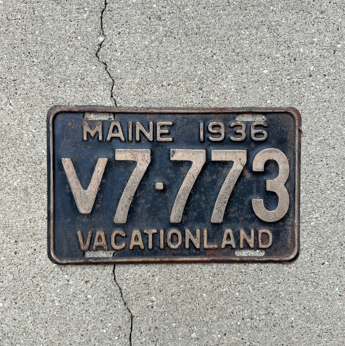 Photo of a 1936 Maine Commercial License Plate Auto Tag Garage Decor Vintage Lucky 7 Repeat Repeating V 7773 with original patina
