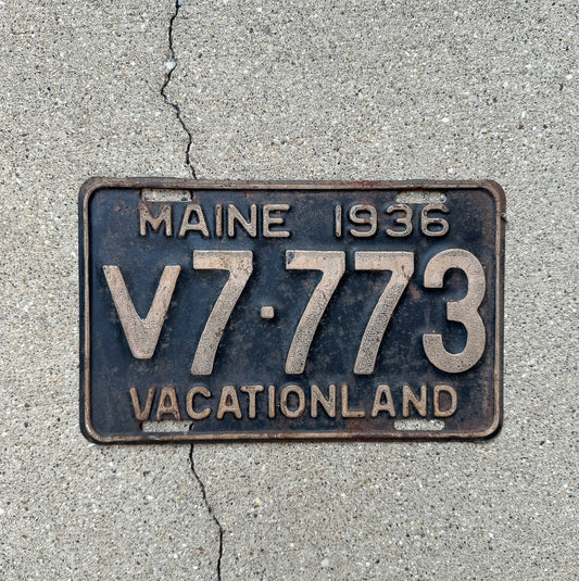 Photo of a 1936 Maine Commercial License Plate Auto Tag Garage Decor Vintage Lucky 7 Repeat Repeating V 7773 with original patina