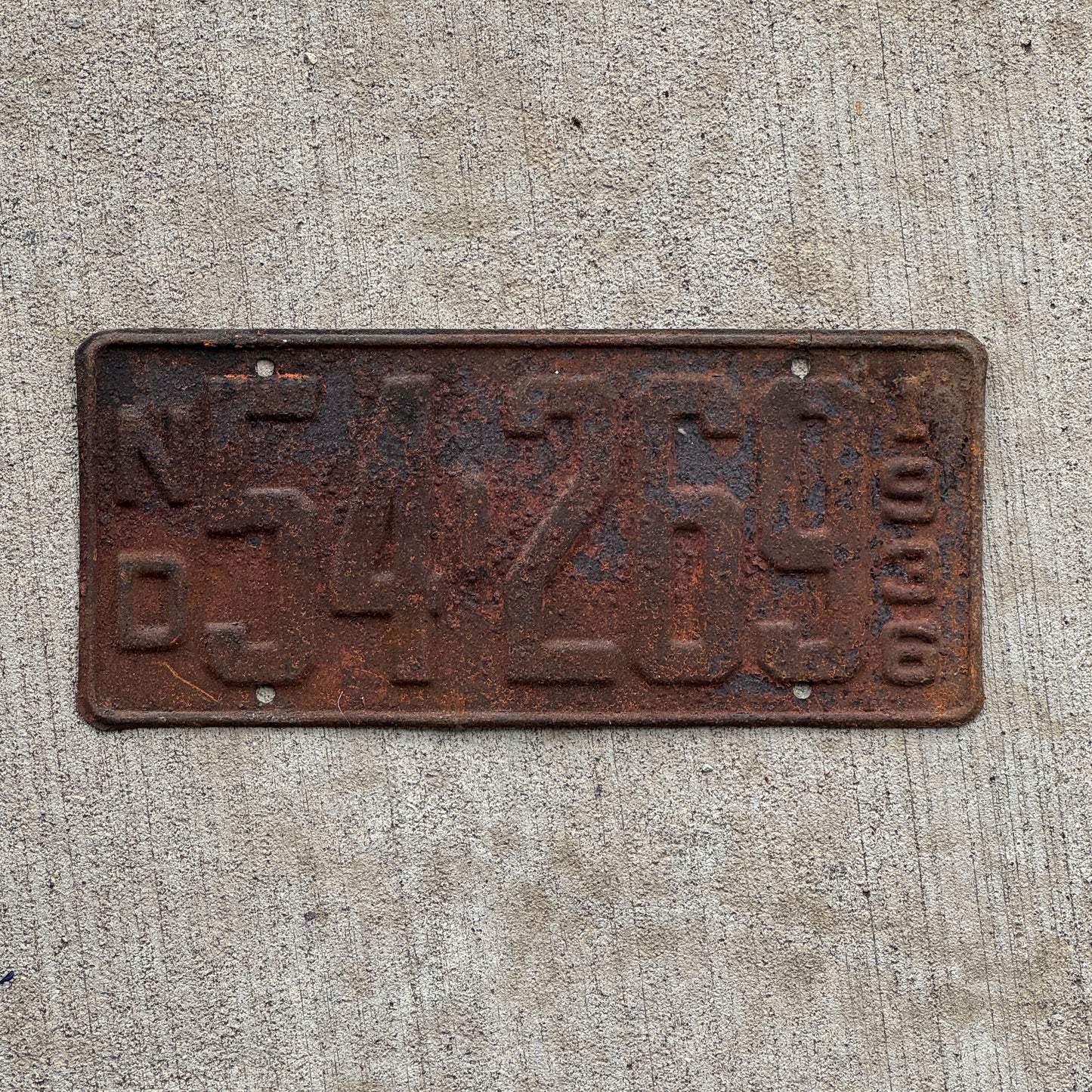 Photo of a 1936 North Dakota License Plate Auto Tag 1 Vintage Garage 54 269 with original patina
