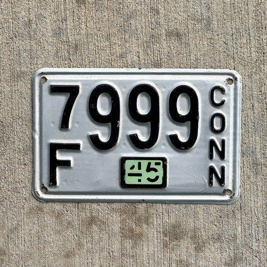 Photo of a 1937 1945 Connecticut License Plate Auto Tag Garage Decor Vintage Repeat Repeating 7F 999 with original patina