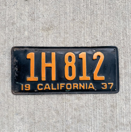 Photo of a 1937 California License Plate Auto Tag Garage Decor Vintage 1H 812 with original patina