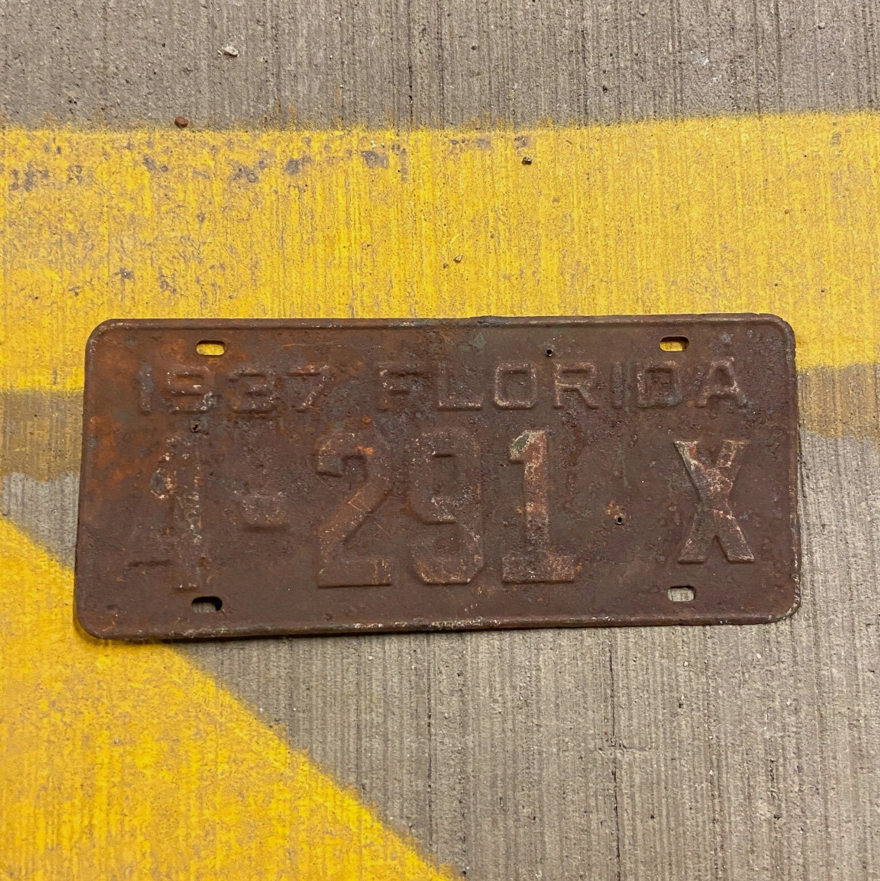 Photo of a 1937 Florida Tax Exempt License Plate Auto Tag Garage Decor Vintage 4 291 X with original patina