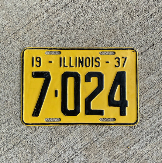 Photo of a 1937 Illinois License Plate Auto Tag Garage Decor Vintage Low Number Four Digit 7024 with original patina