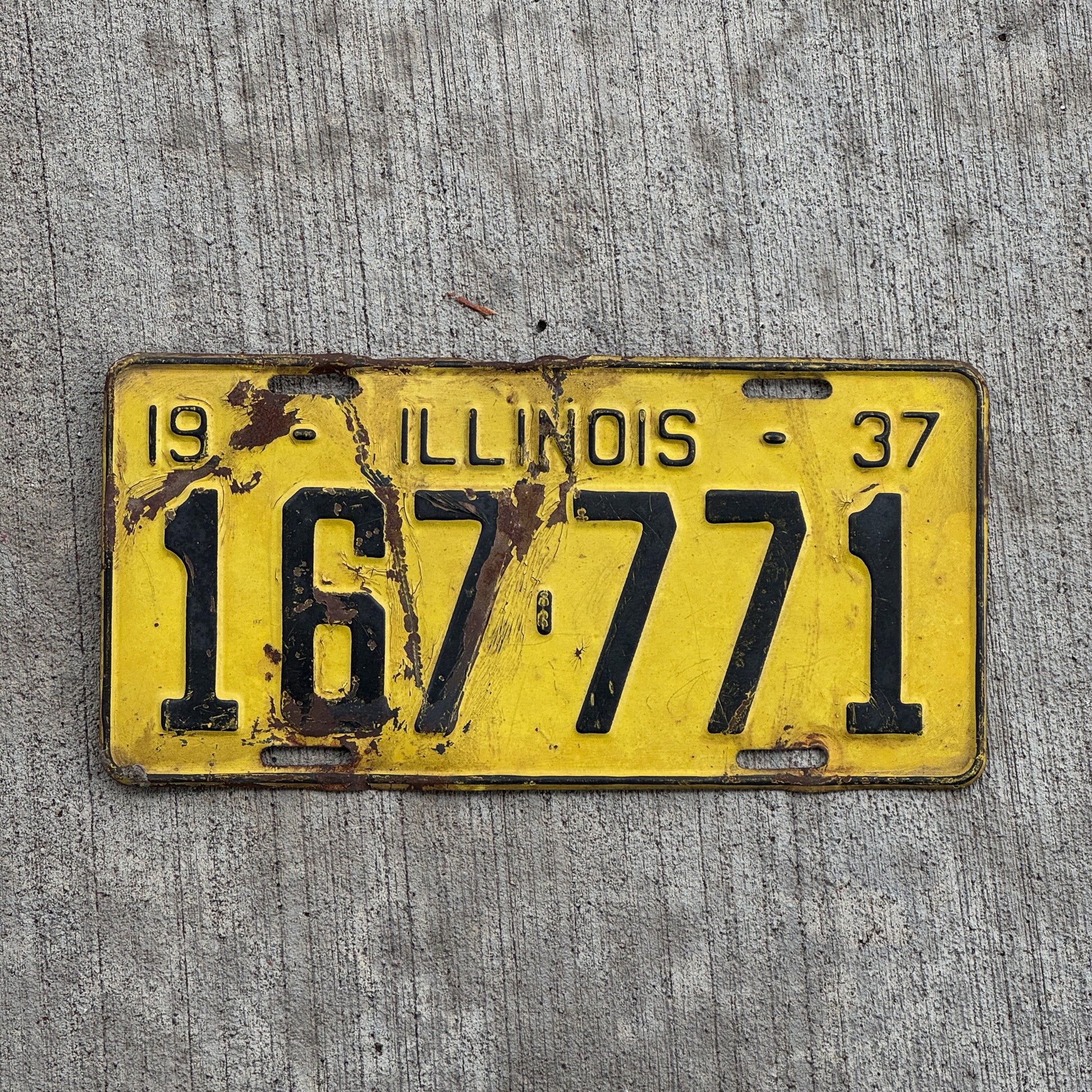 Photo of a 1937 Illinois License Plate Auto Tag Garage Decor Vintage Lucky 7 Repeat Repeating 167 771 with original patina