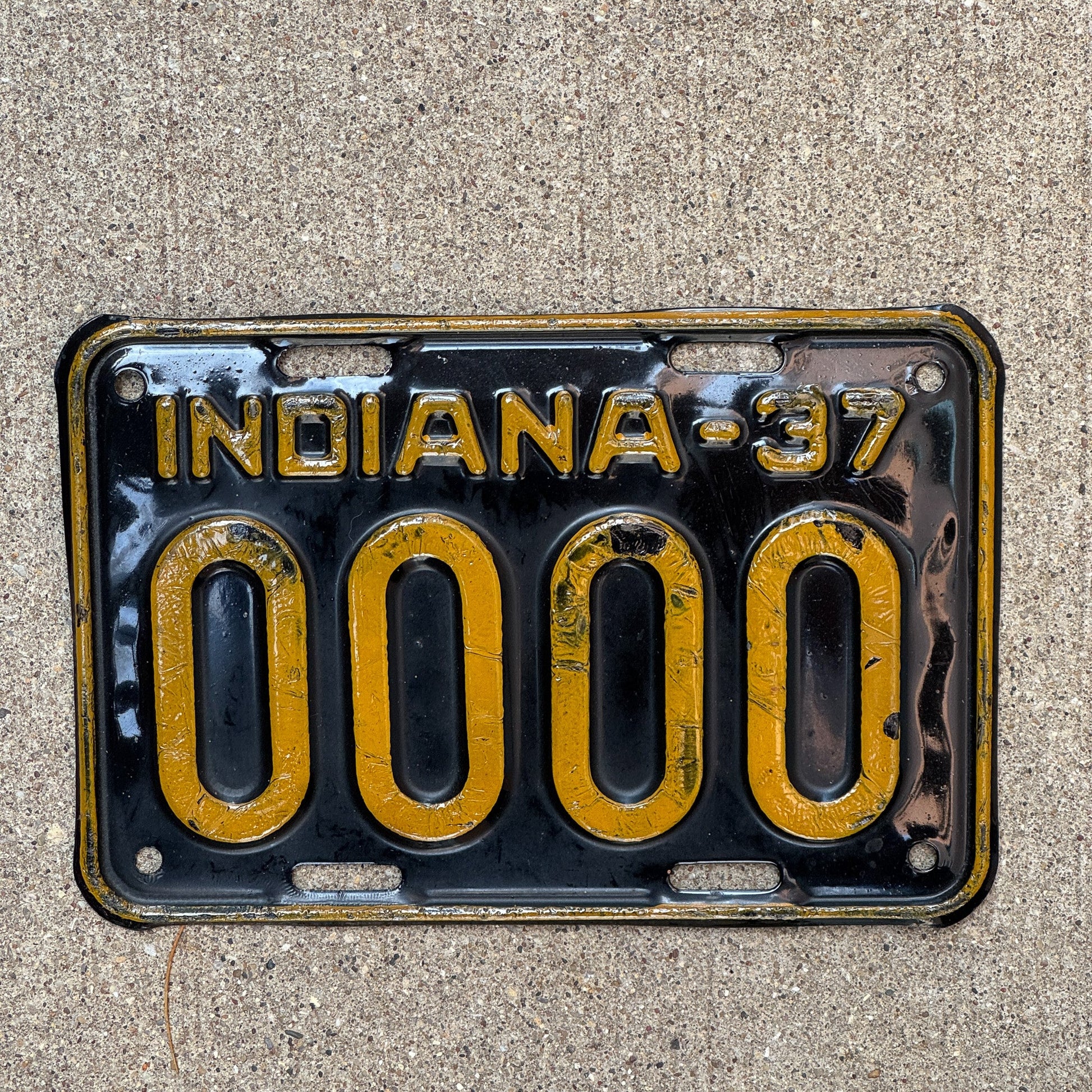 Photo of a 1937 Indiana Sample License Plate Auto Tag Garage Decor Vintage 0000 with original patina