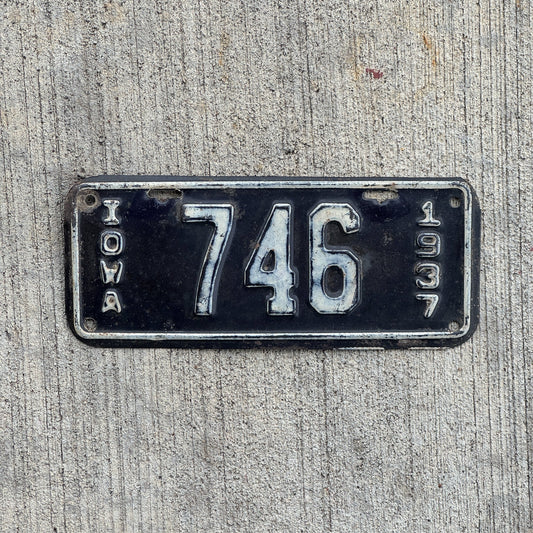 Photo of a 1937 Iowa Motorcycle License Plate Auto Tag Garage Decor Vintage ALPCA Archive Example Low Number Three Digit 746 with original patina
