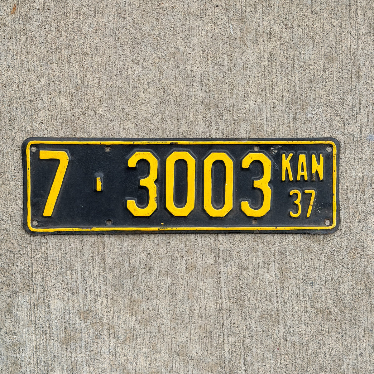 Photo of a 1937 Kansas License Plate Auto Tag Garage Decor Vintage 7 3003 with original patina