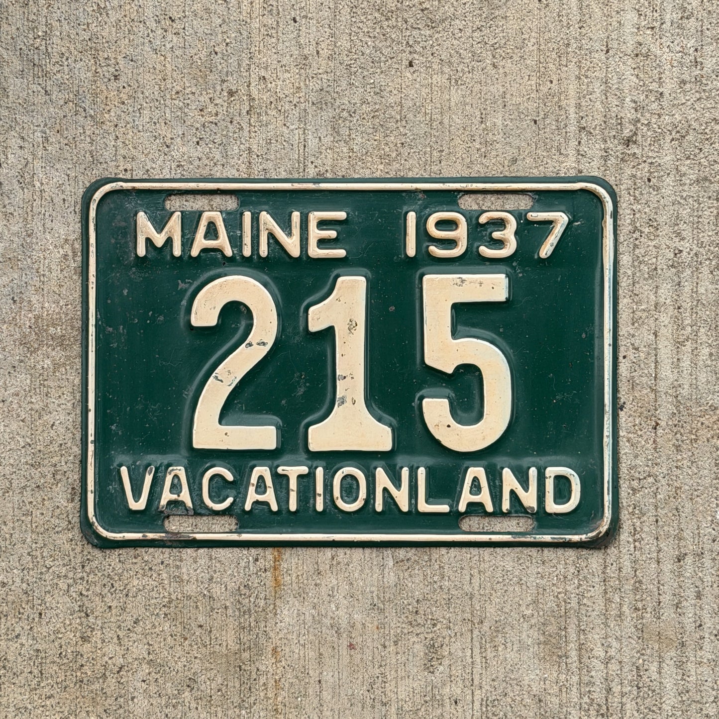 Photo of a 1937 Maine License Plate Auto Tag Garage Decor Vintage Low Number Three Digit 215 with original patina