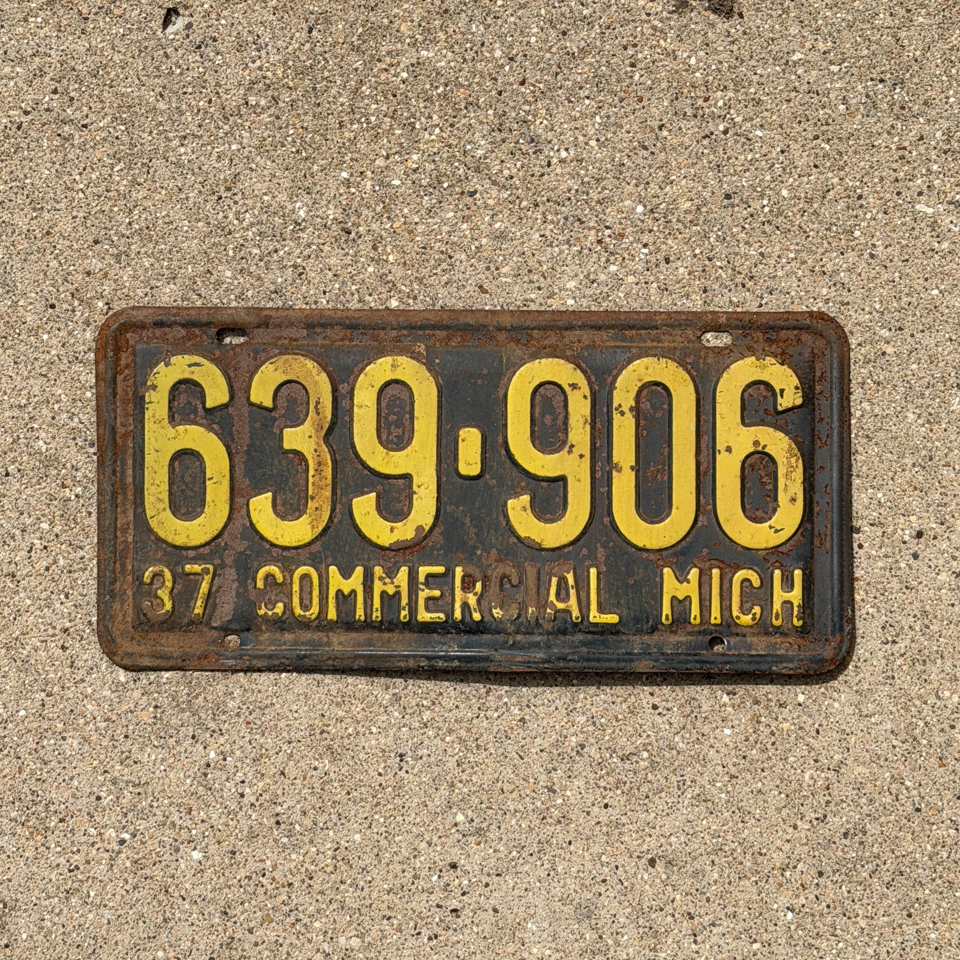 Photo of a 1937 Michigan Commercial License Plate Auto Tag 1 Vintage Garage 639 906 with original patina