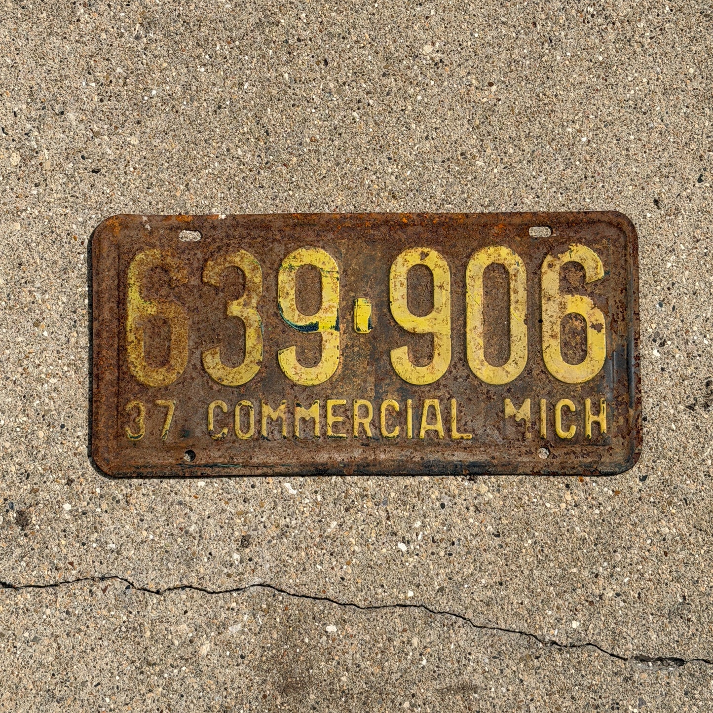 Photo of a 1937 Michigan Commercial License Plate Auto Tag 2 Vintage Garage 639 906 with original patina