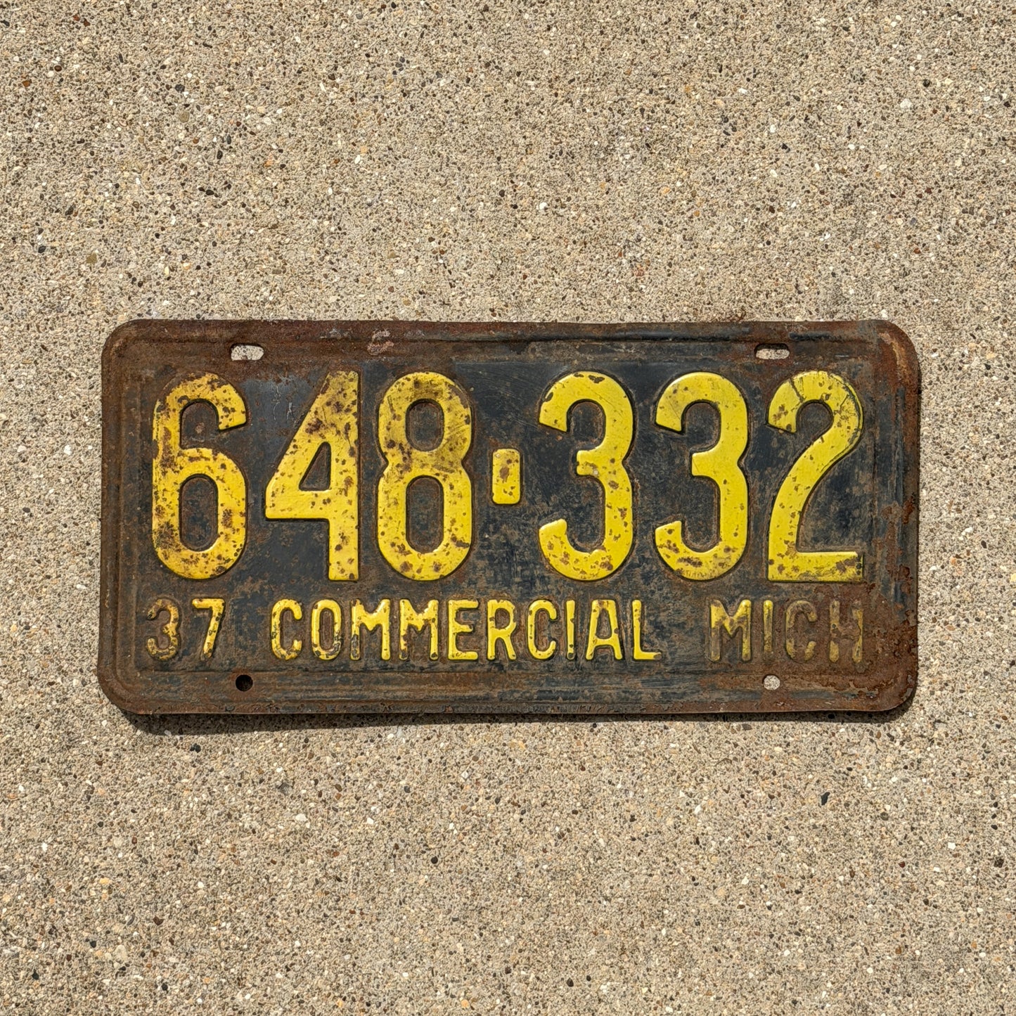 Photo of a 1937 Michigan Commercial License Plate Auto Tag Garage Decor Vintage 648 332 with original patina