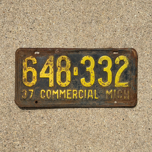 Photo of a 1937 Michigan Commercial License Plate Auto Tag Garage Decor Vintage 648 332 with original patina