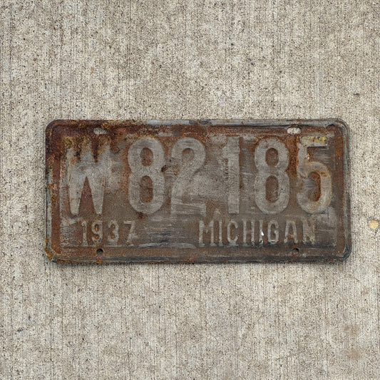 Photo of a 1937 Michigan License Plate Auto Tag 1 Vintage Garage W 82185 with original patina
