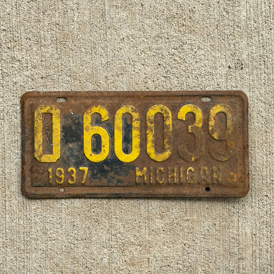 Photo of a 1937 Michigan License Plate Auto Tag Garage Decor Vintage 0 60039 with original patina