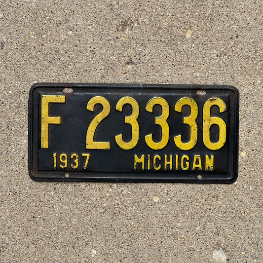 Photo of a 1937 Michigan License Plate Auto Tag Garage Decor Vintage Repeat Repeating F 23336 with original patina