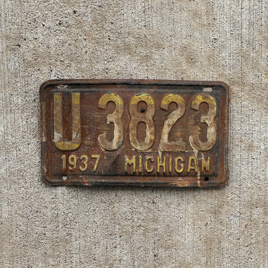 Photo of a 1937 Michigan License Plate Auto Tag Garage Decor Vintage U 3823 with original patina