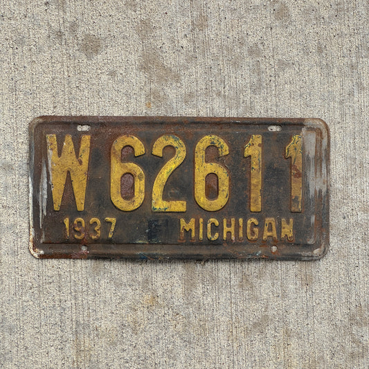 Photo of a 1937 Michigan License Plate Auto Tag Garage Decor Vintage W 62611 with original patina