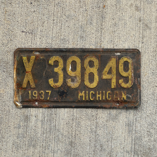 Photo of a 1937 Michigan License Plate Auto Tag Garage Decor Vintage X 39849 with original patina