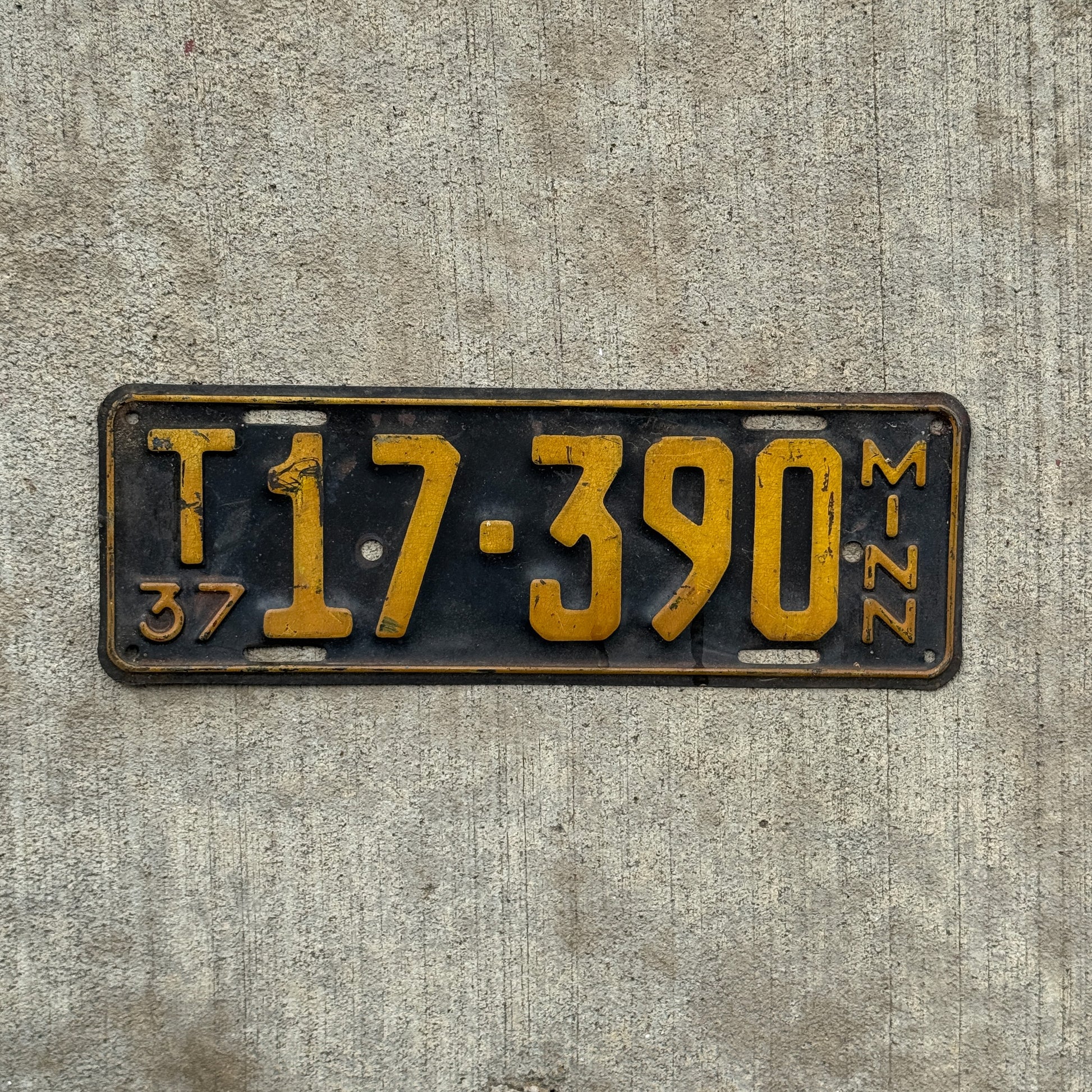 Photo of a 1937 Minnesota Farm Truck License Plate Auto Tag Garage Decor Vintage T 17 390 with original patina