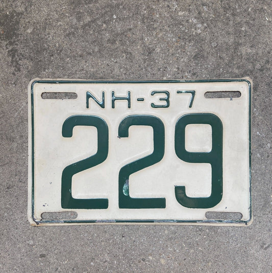 Photo of a 1937 New Hampshire License Plate Auto Tag Garage Decor Vintage Low Number Three Digit 229 with original patina