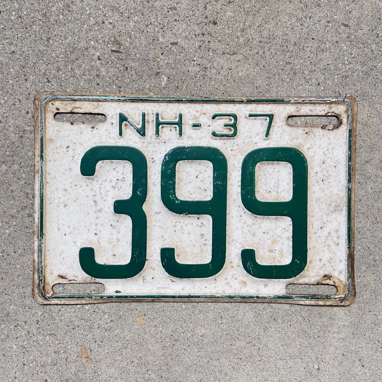 Photo of a 1937 New Hampshire License Plate Auto Tag Garage Decor Vintage Low Number Three Digit 399 with original patina