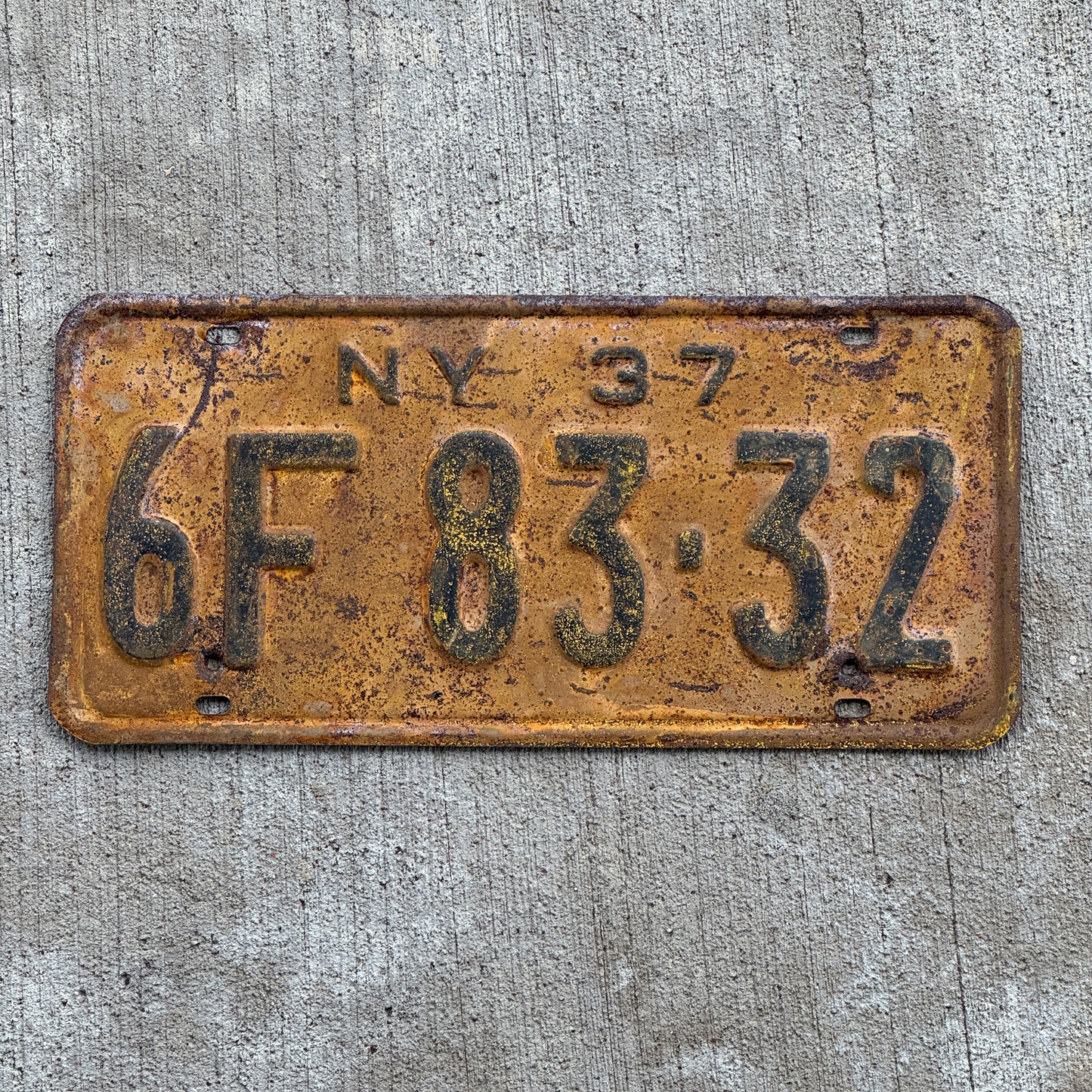 Photo of a 1937 New York License Plate Auto Tag Garage Decor Vintage 6F 83 32 with original patina