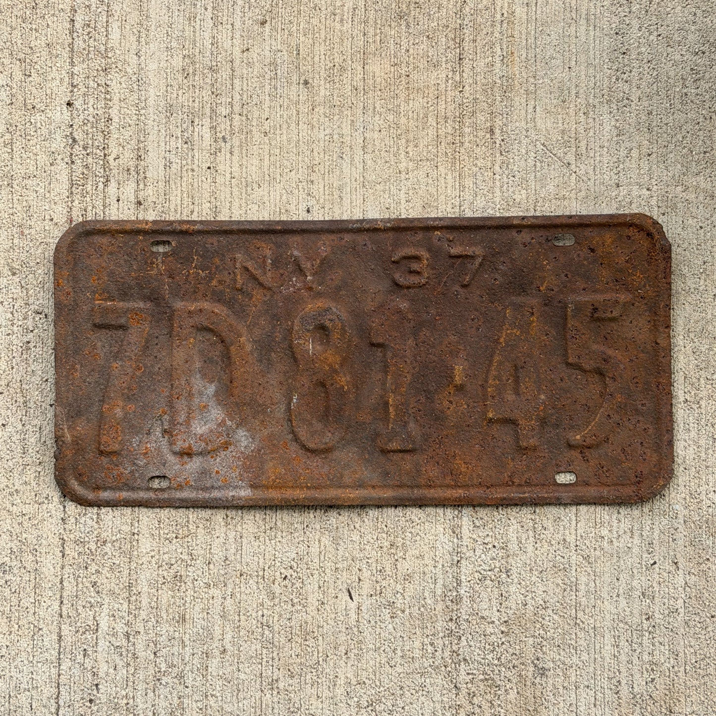 Photo of a 1937 New York License Plate Auto Tag Garage Decor Vintage 7D 81 45 with original patina