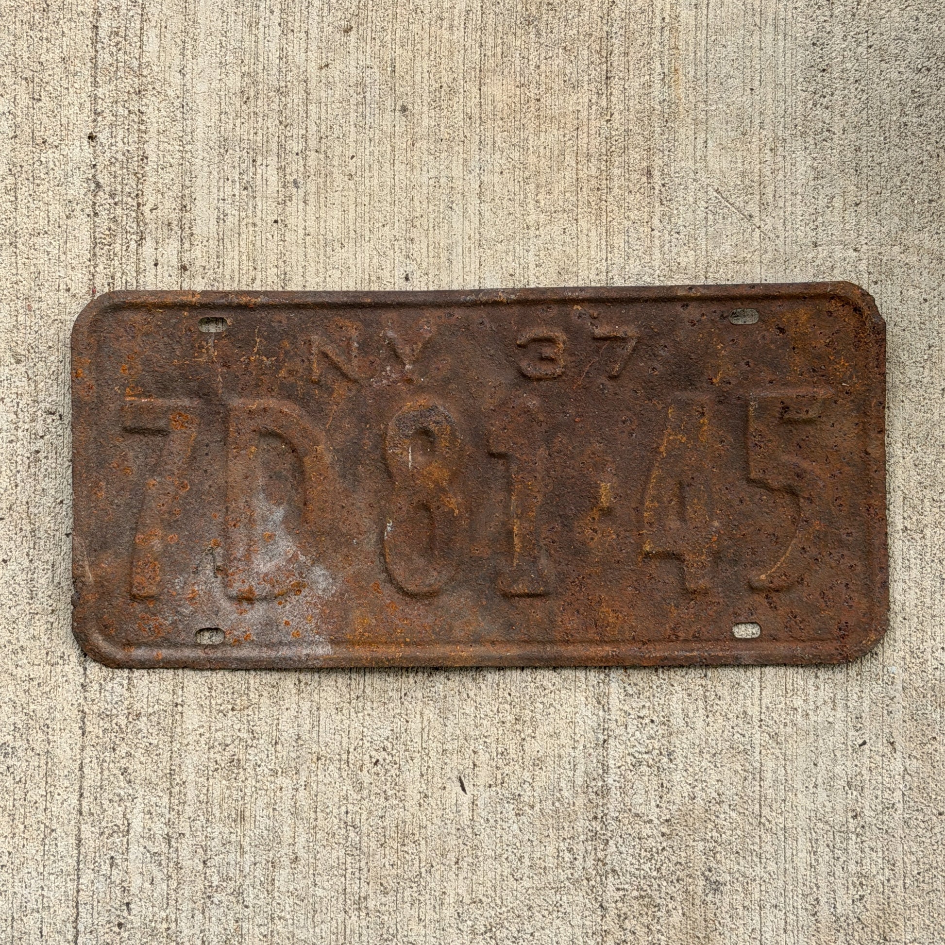 Photo of a 1937 New York License Plate Auto Tag Garage Decor Vintage 7D 81 45 with original patina