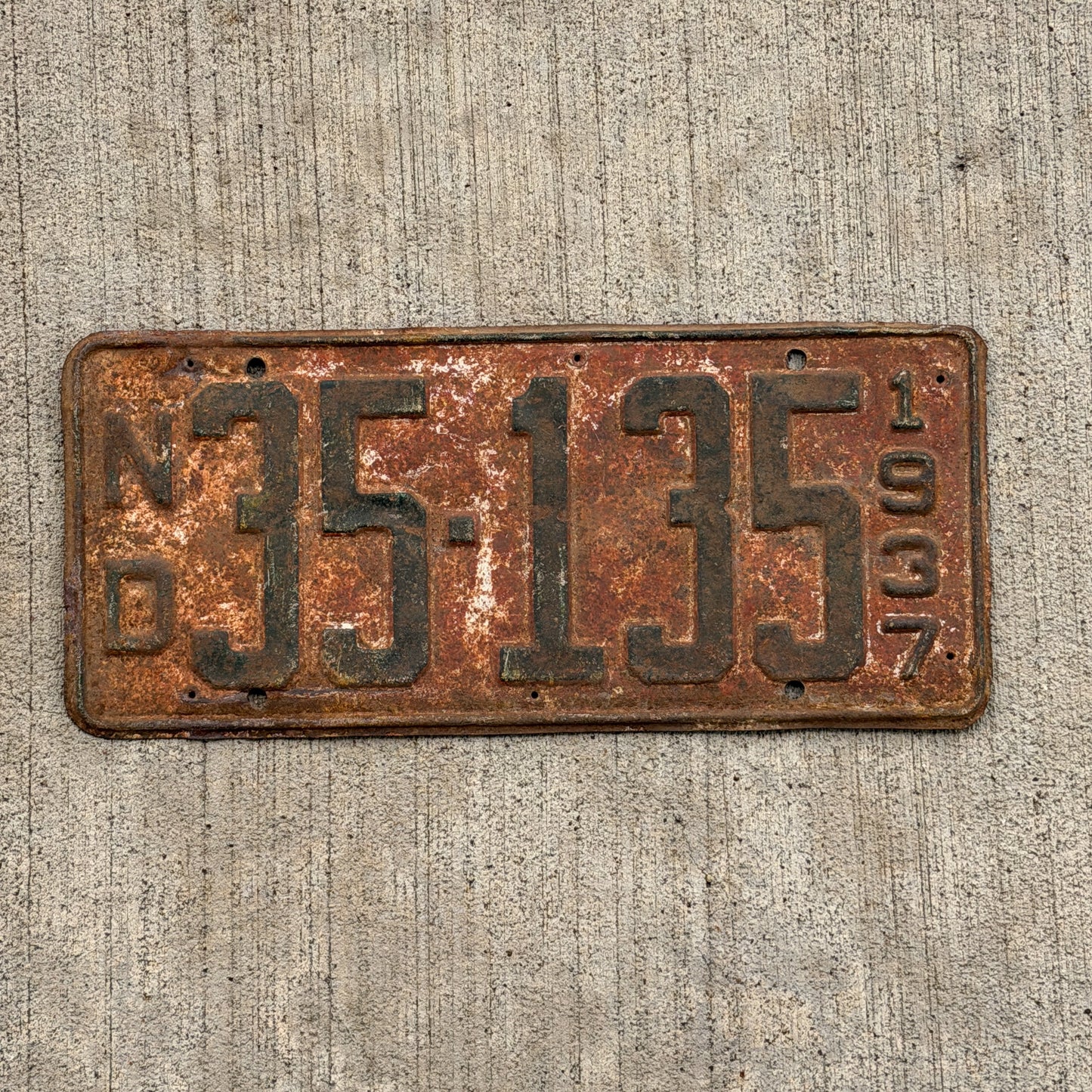 Photo of a 1937 North Dakota License Plate Auto Tag Garage Decor Vintage 35 135 with original patina