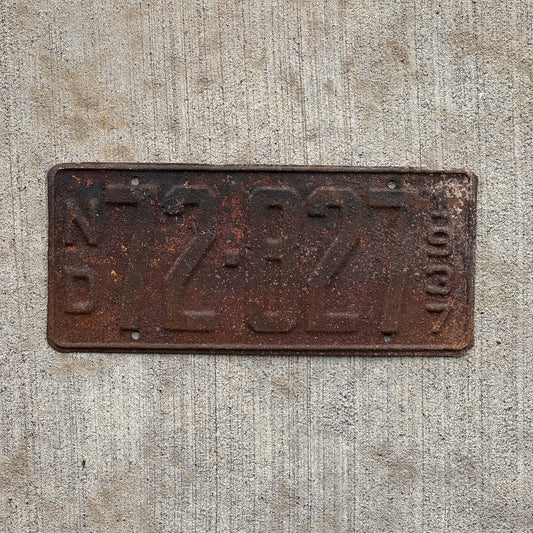 Photo of a 1937 North Dakota License Plate Auto Tag Garage Decor Vintage 72 827 with original patina