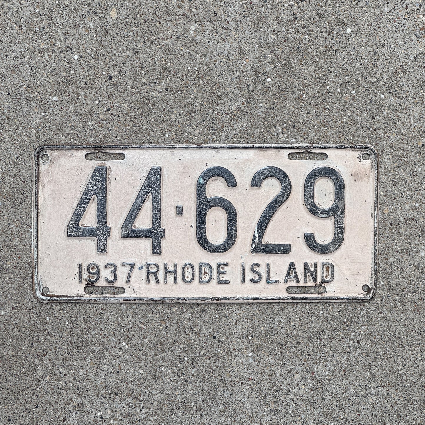 Photo of a 1937 Rhode Island License Plate Auto Tag Garage Decor Vintage 44 629 with original patina