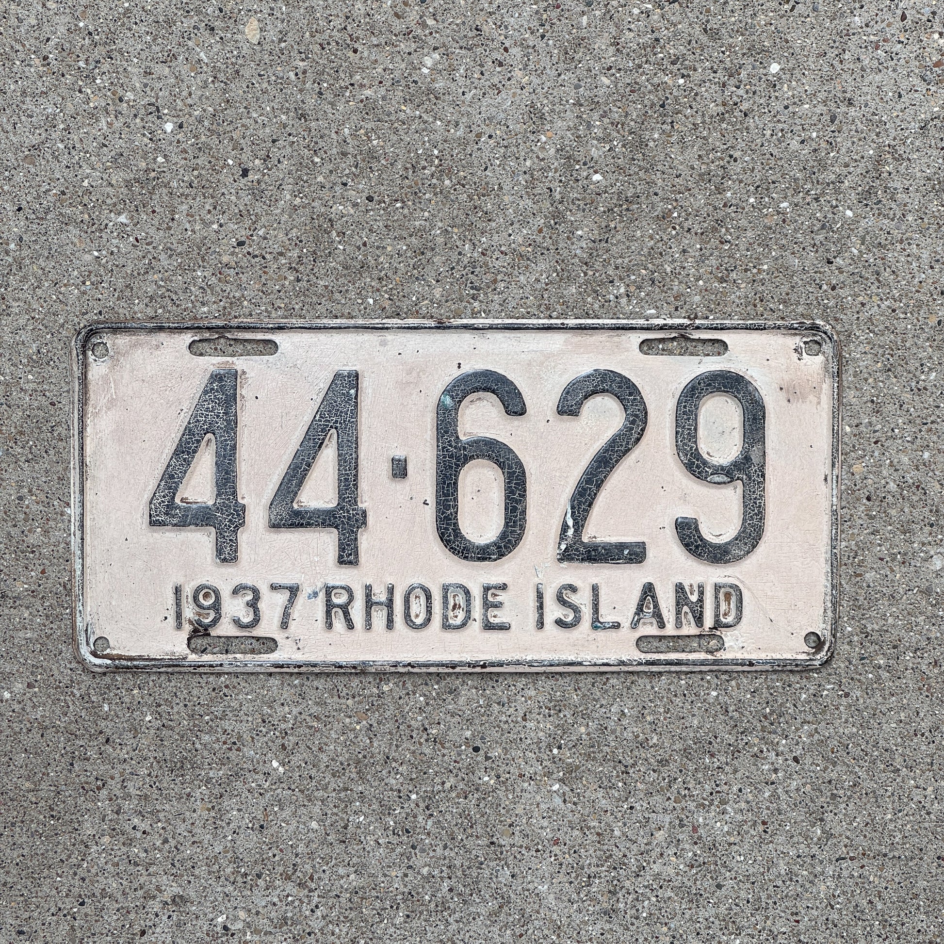 Photo of a 1937 Rhode Island License Plate Auto Tag Garage Decor Vintage 44 629 with original patina