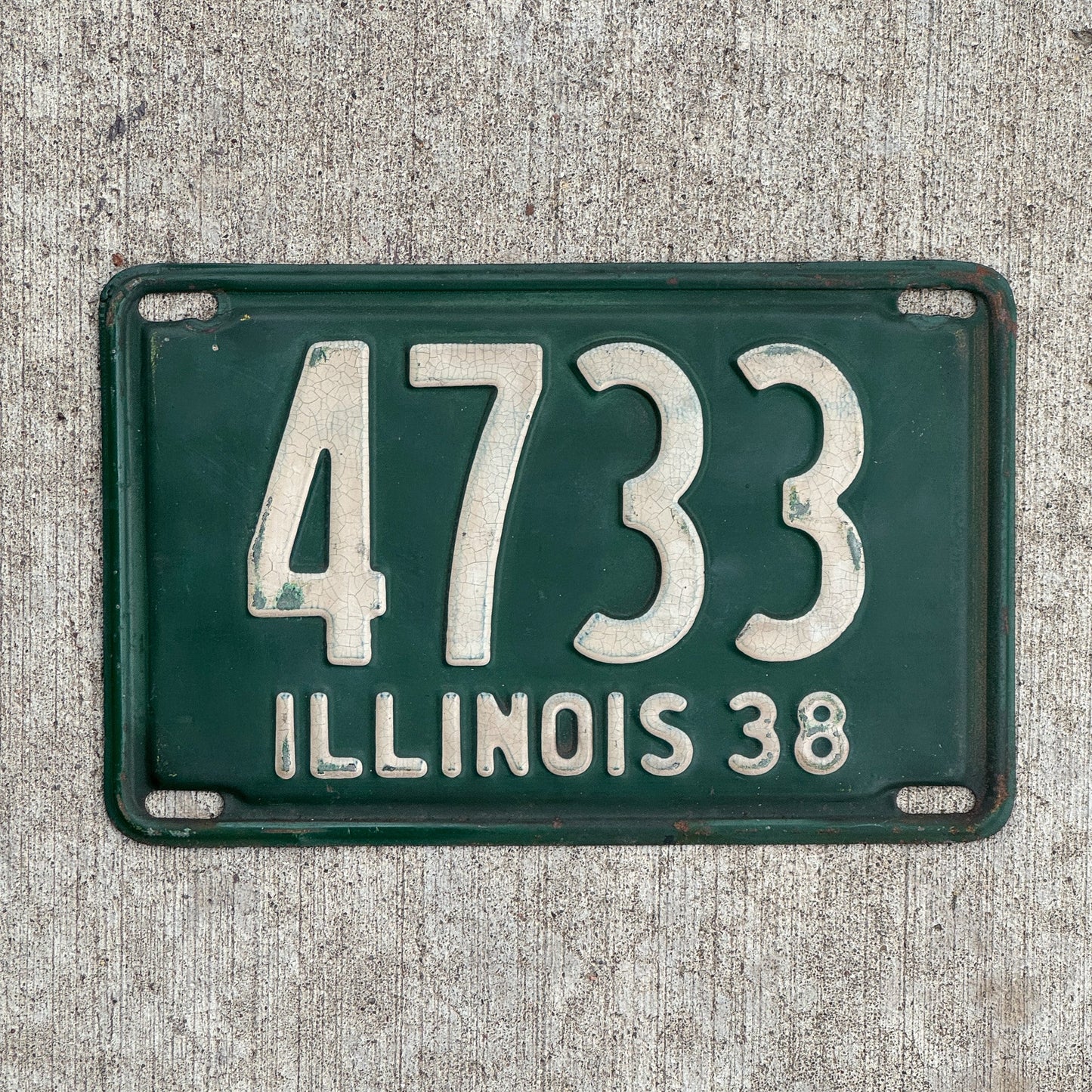 Photo of a 1938 Illinois License Plate Auto Tag Garage Decor Vintage Low Number Four Digit 4733 with original patina