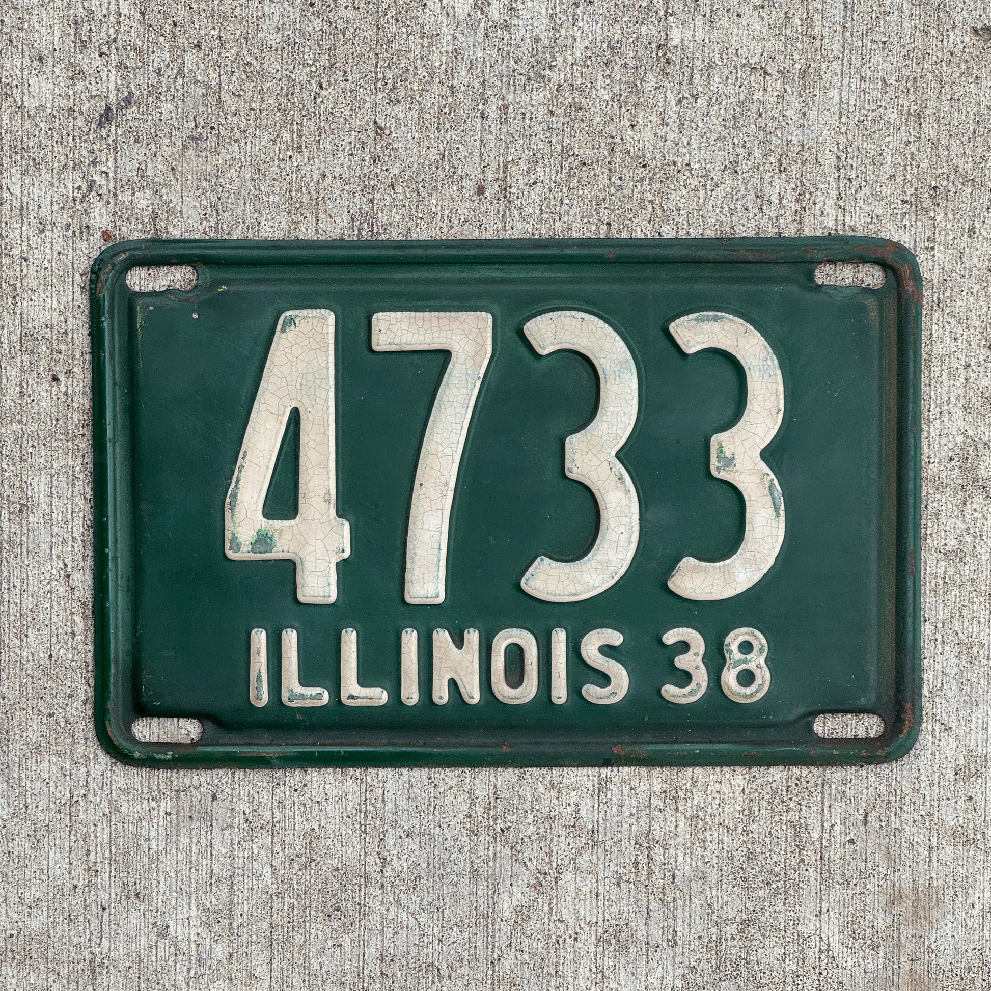 Photo of a 1938 Illinois License Plate Auto Tag Garage Decor Vintage Low Number Four Digit 4733 with original patina