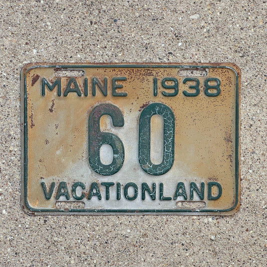 Photo of a 1938 Maine License Plate Auto Tag Garage Decor Vintage Low Number Two Digit 60 with original patina