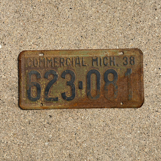 Photo of a 1938 Michigan Commercial License Plate Auto Tag Garage Decor Vintage 623 081 with original patina