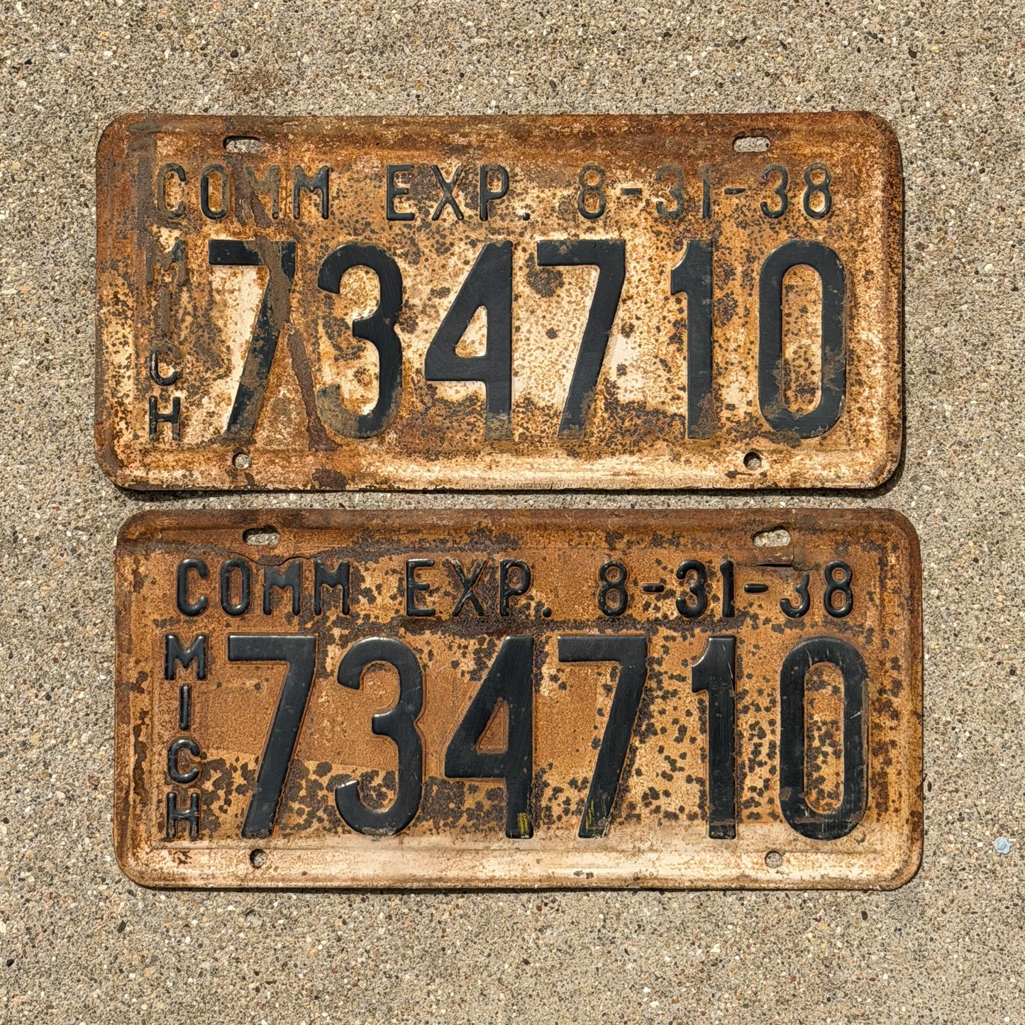 Photo of a 1938 Michigan Commercial License Plate Pair Auto Tag Garage Decor Vintage Half Year 734 710 with original patina