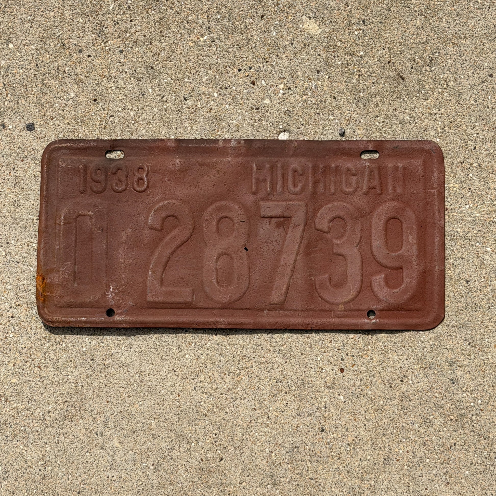Photo of a 1938 Michigan License Plate Auto Tag Garage Decor Vintage 0 28739 with original patina