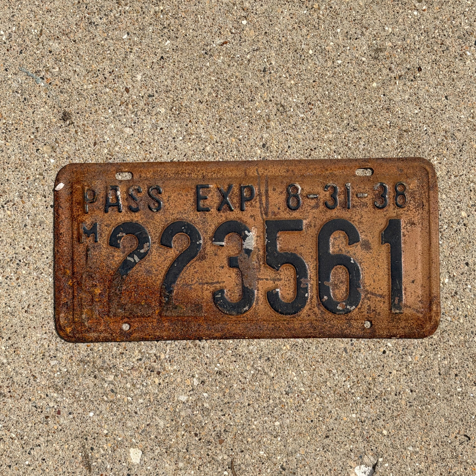 Photo of a 1938 Michigan License Plate Auto Tag Garage Decor Vintage Half Year 223 561 with original patina