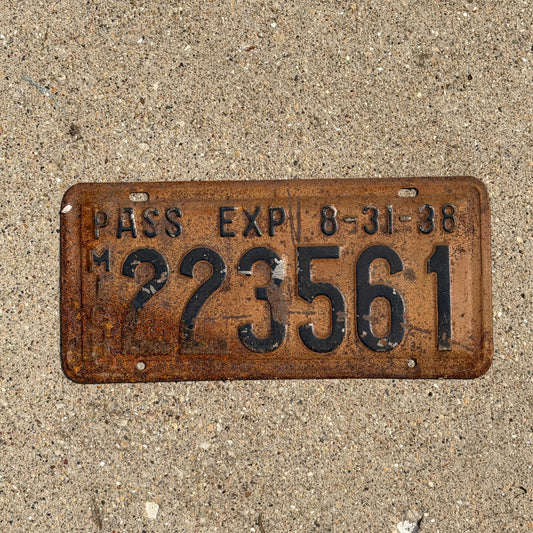 Photo of a 1938 Michigan License Plate Auto Tag Garage Decor Vintage Half Year 223 561 with original patina