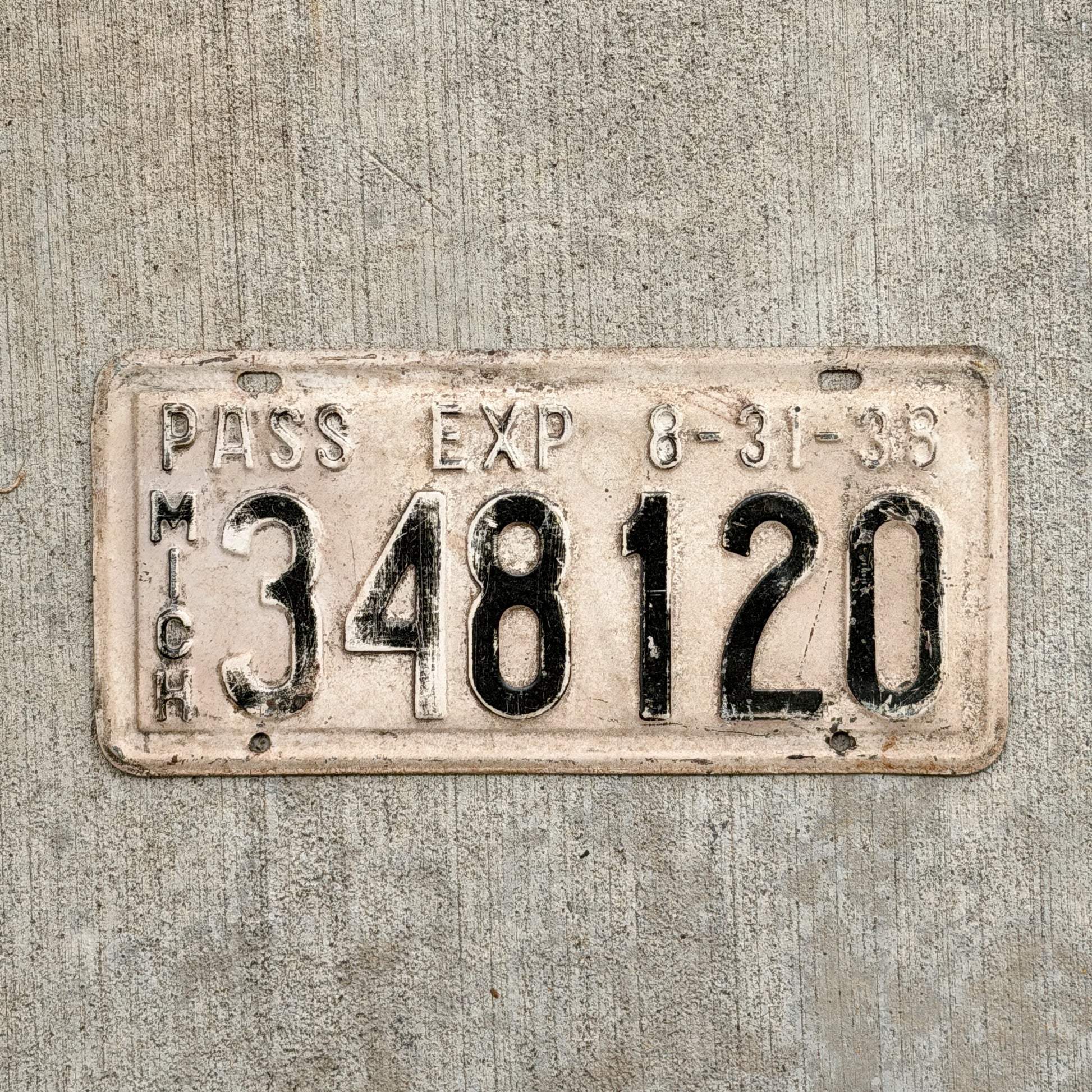Photo of a 1938 Michigan License Plate Auto Tag Garage Decor Vintage Half Year 348 120 with original patina